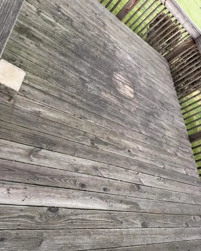 Weathered wood deck before professional cleaning