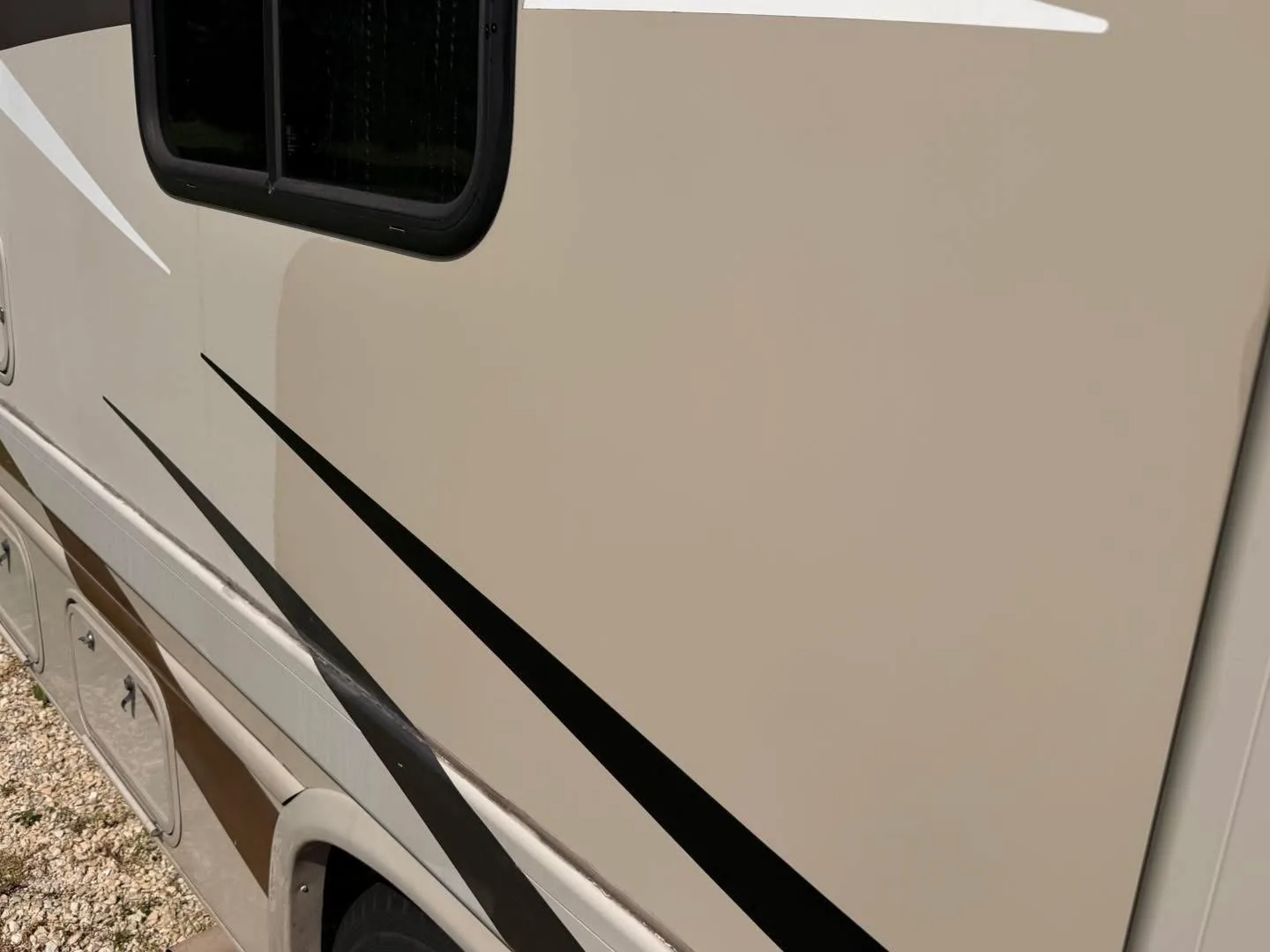 Close-up of a clean RV exterior after professional detailing
